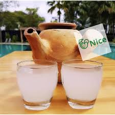 Palm wine in calabash at a Nigerian event